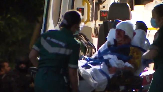 Burdon is loaded into an ambulance. Picture: Nine News Adelaide