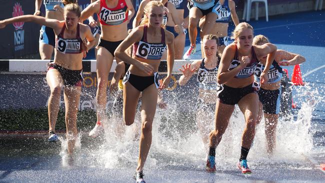 Zoe Manning, left, Kiera Moore and Tyla Lumley in the steeplecahse at the Australian Athletic Track and Field Championships in Sydney.                        IMAGE Lizel Moore.