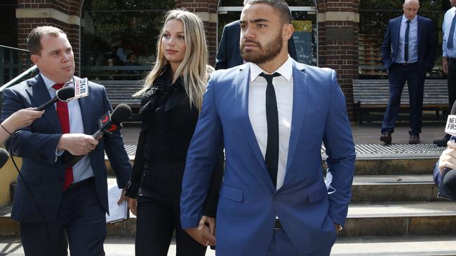 Dylan Walker and Alexandra Ivkovic left court hand in hand. Picture: David Swift