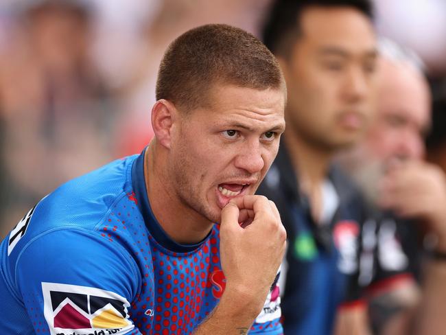 SYDNEY, AUSTRALIA - MARCH 12: Kalyn Ponga of the Knights watches from the bench during the round two NRL match between Wests Tigers and Newcastle Knights at Leichhardt Oval on March 12, 2023 in Sydney, Australia. (Photo by Cameron Spencer/Getty Images)