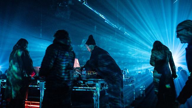 Icelandic composer Hildur Guðnadóttir (right, in front of light) and her collaborators on stage during a performance of her score for the HBO TV miniseries Chernobyl during Dark Mofo 2022, the annual winter art and music festival. Picture: Rosie Hastie / Dark Mofo