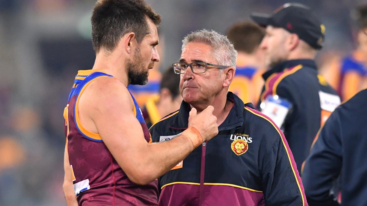 Luke Hodge talks with coach Chris Fagan.