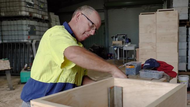 Peter Johnston builds some beehives.