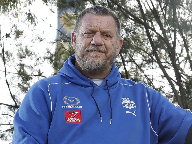 NCA. MELBOURNE, AUSTRALIA. April 5th , 2025 . North Melbourne training at Arden St.   North Melbourne ruck coach Damian Monkhorst on his motorbike that he rides to work everyday  . Picture: Michael Klein