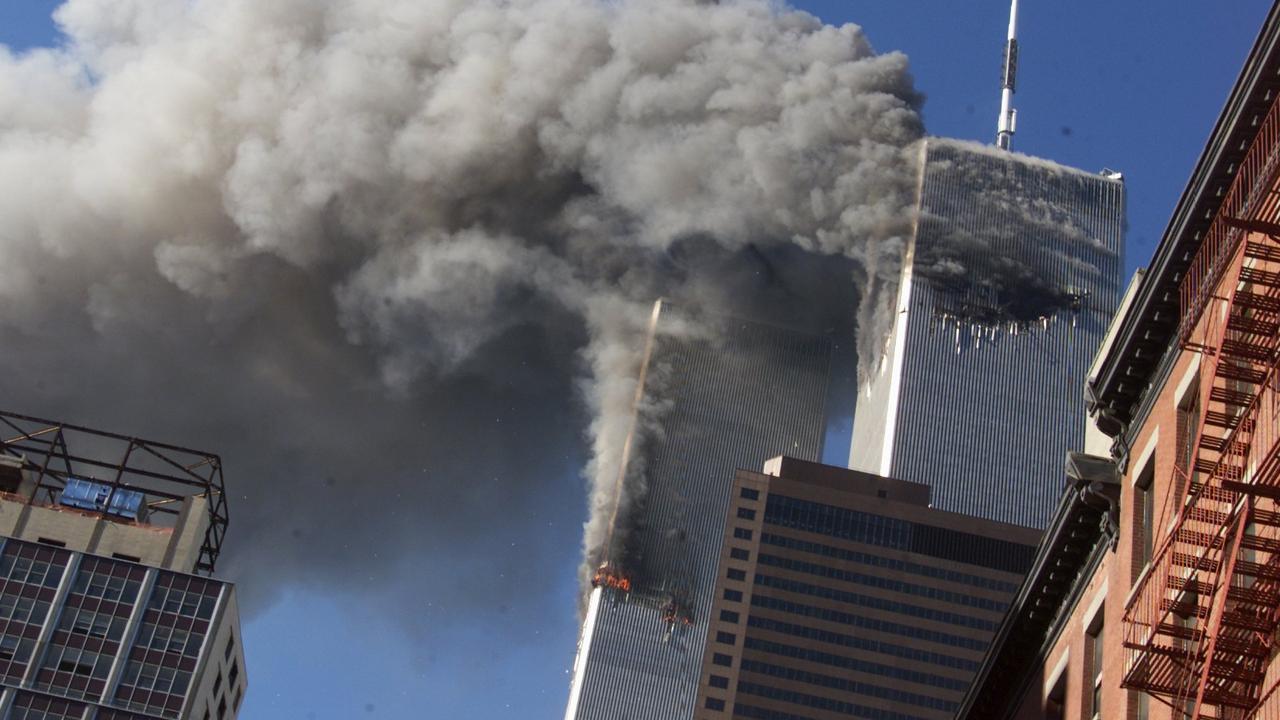 Smoke rising from the burning twin towers of the World Trade Center. Picture: AP Photo/Richard Drew