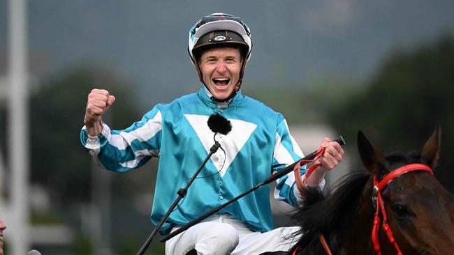 James McDonald celebrates after winning the Hong Kong Cup aboard Romantic Warrior in December last year. Picture: AFP