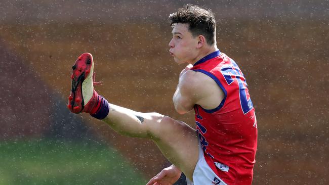 Dion Johnstone kicks at goal for Port Melbourne in the VFL.