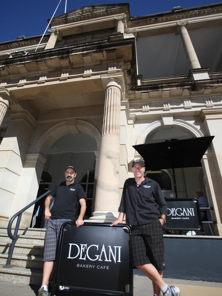 File photo of George Pezaros and Wayne Clifford at the cafe opening in 2011. Photo Allan Reinikka / The Morning Bulletin