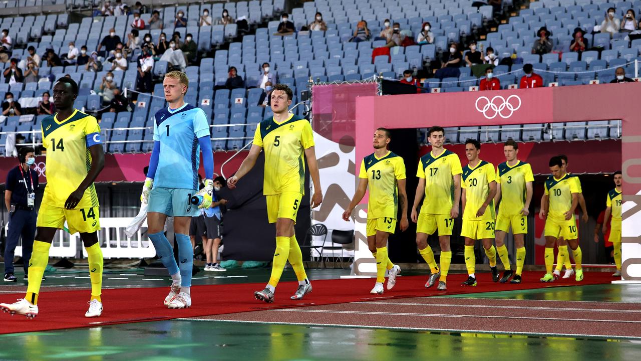 Thomas Deng #14 of Team Australia leads the team on to the pitch prior to the Men's Group C match between Australia and Eygpt on day five of the Tokyo 2020 Olympic Games in Rifu, Miyagi, Japan. (Photo by Koki Nagahama/Getty Images)