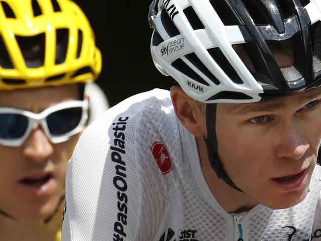 Britain's Geraint Thomas, left, was riding for teammate Chris Froome, right, before his crash.