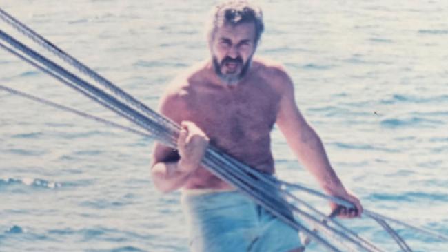 Celebrated building designer Chris Vandyke, known for his Far North Queensland pole homes, has died aged 85. He is pictured here on a boat in his younger days.