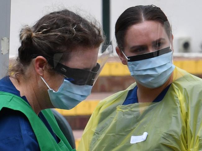 Nursing staff from St. Vincentâ€™s Hospital see local residents and backpackers at a COVID-19 testing clinic in the Bondi Pavillion on Bondi Beach in Sydney, Wednesday, April 1, 2020. The clinic has been set up as the number of cases continue to rise in the eastern suburbs. (AAP Image/Dean Lewins) NO ARCHIVING