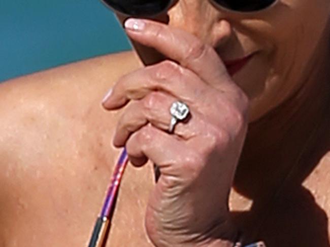 A bikini clad Sharon Stone looks to be wearing an engagement ring. Picture: MEGA