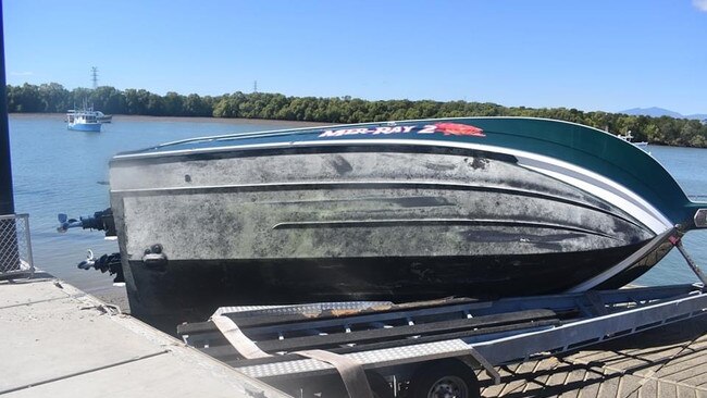 A large boat flipped off its trailer while it was being reversed down a boat ramp at Townsville Recreational Boating Park. Photo: Matt Palmer