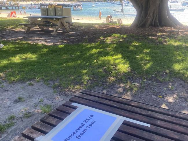 The message, taped onto not one but two tables in the area, lit a fire under Sydney beachgoers after it was posted online.