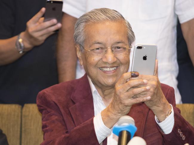 Mahathir Mohamad photographs the media at a hotel in Kuala Lumpur, Malaysia. Picture: AP