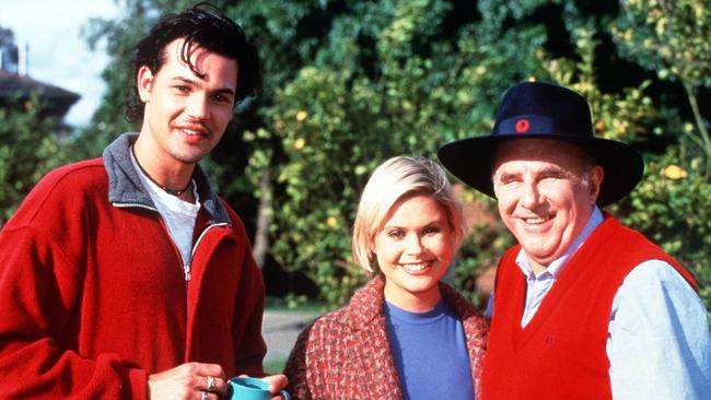 Clive James during guest appearance on TV show Neighbours with Richard Grieve and Emma Harrison Grieve and Emma Harrison.