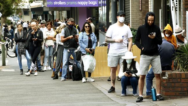 A long queue at Centrelink at Sydney’s Bondi Junction on Monday. Picture: John Appleyard