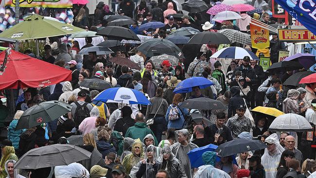 The rain didn’t scare away the Ekka crowds on Monday. Pic: Lyndon Mechielsen