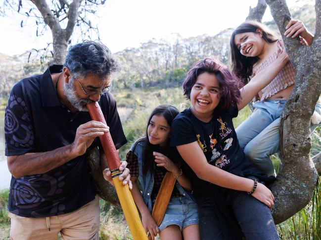 EMBARGO FOR NETWORK USE ONLY - CONTACT KRISTI MILLERIndigenous elders passing on their culture and knowledge to younger generations in the Blue Mountains. Pictured is Uncle Peter Williams with his kids Joowal, 9, and Yulubirki 11, and Miki May 11. Picture: David Swift