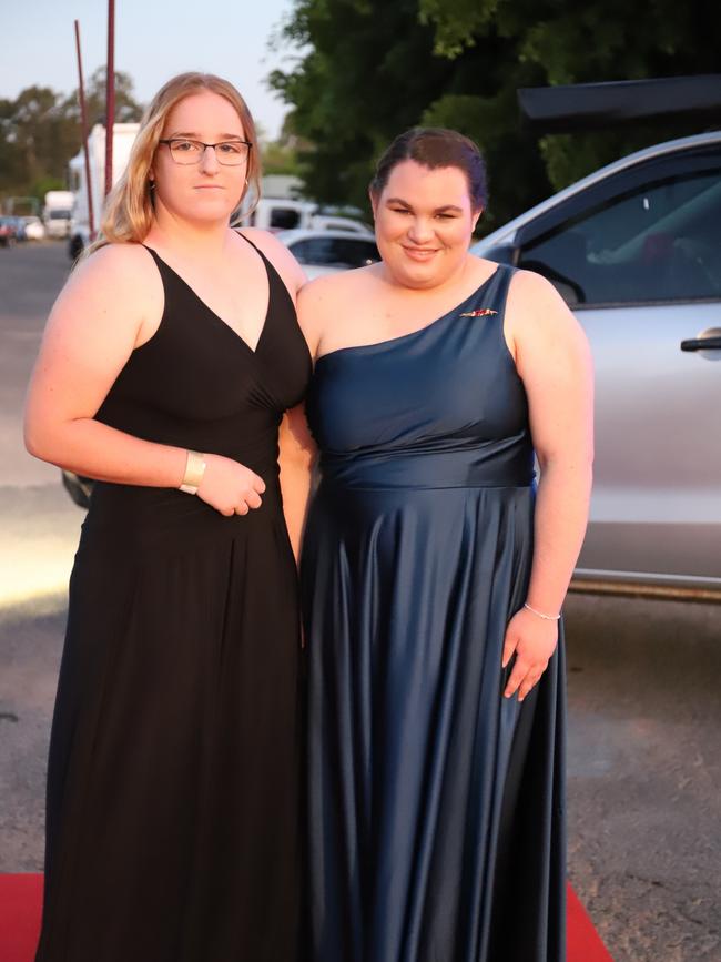 Megan and Hayley Quick at the James Nash State High School formal 2022.