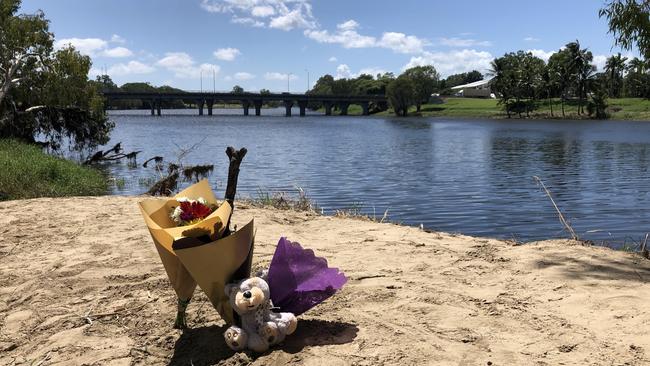 Flowers have been laid for Barak Austral, 5, and Jhulio Sariago, 3, who were found dead in Ross River on Tuesday, February 26, 2019. Picture: Madura McCormack