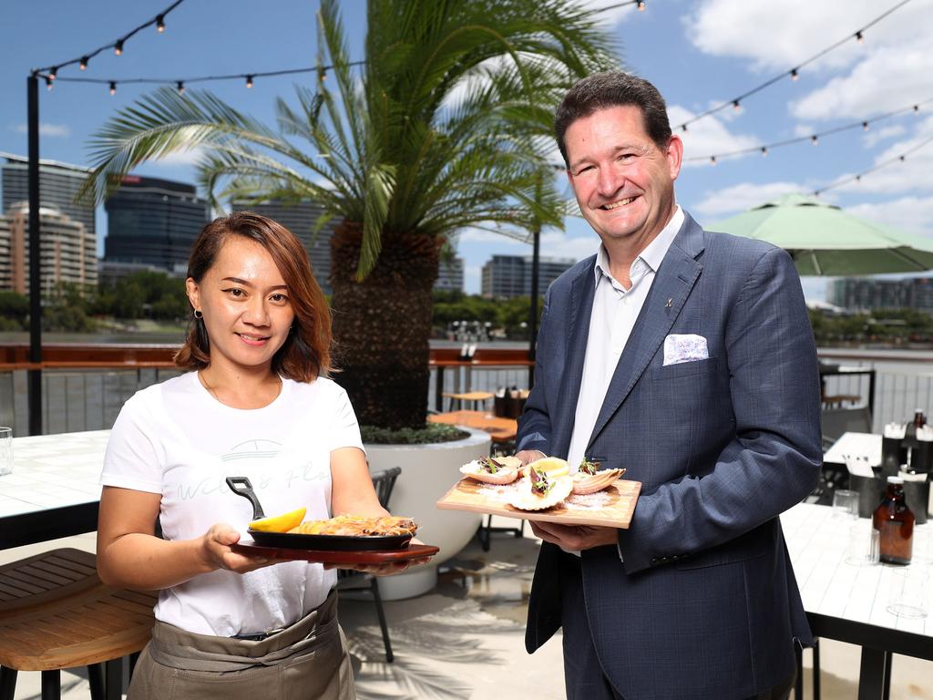 Will &amp; Flow staff member Jo Bizini with Treasury Brisbane COO Kelvin Dodt. Picture: Peter Wallis