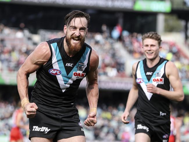 AFL - Port Adelaide v Sydney Swans - Round 21 - Adelaide Oval. Charlie Dixon celebrates his goal with the Port faithful. Picture SARAH REED