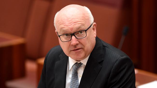 The fact that George Brandis was silly enough to gossip in front of a live microphone suggests he brings some insights to the subject of mediocrity. Picture: AAP