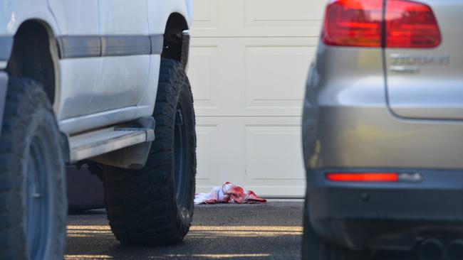 Bloodied towels at the scene of the shooting and attack. Picture: Brenton Edwards