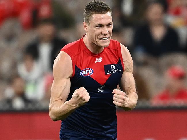 MELBOURNE, AUSTRALIA - MAY 08: Tom McDonald of the Demons celebrates kicking a goal during the round eight AFL match between the Melbourne Demons and the Sydney Swans at Melbourne Cricket Ground on May 08, 2021 in Melbourne, Australia. (Photo by Quinn Rooney/Getty Images)