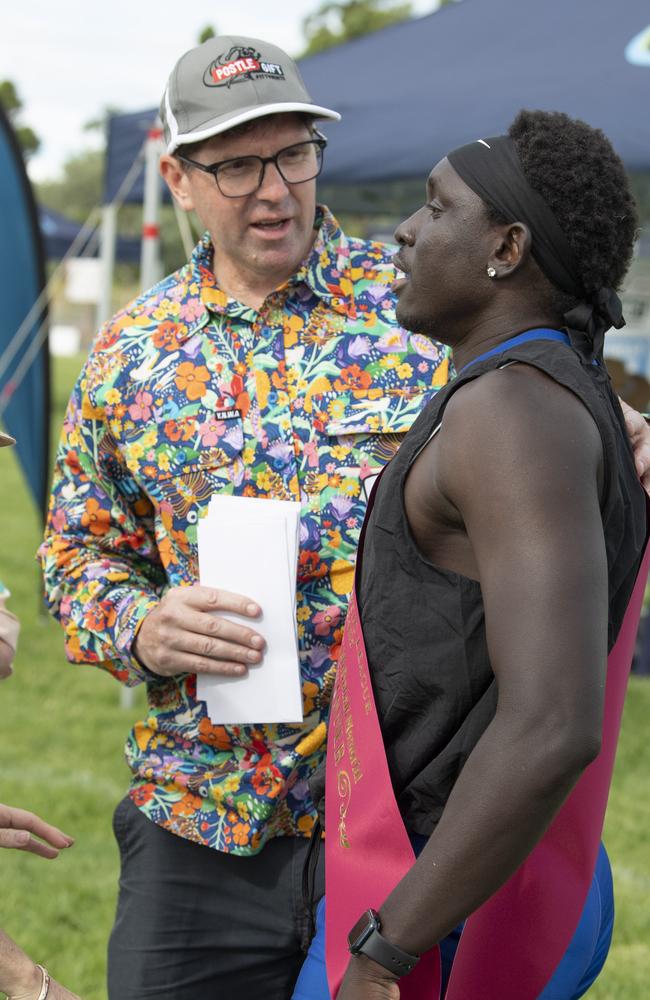 Geoff McDonald congratulates Anas Abu Ganaba after winning the John 'Cracker'&#147; McDonald 300 metres open. The Arthur Postle Gift at Pittsworth. Saturday 18th January, 2025. Picture: Nev Madsen.