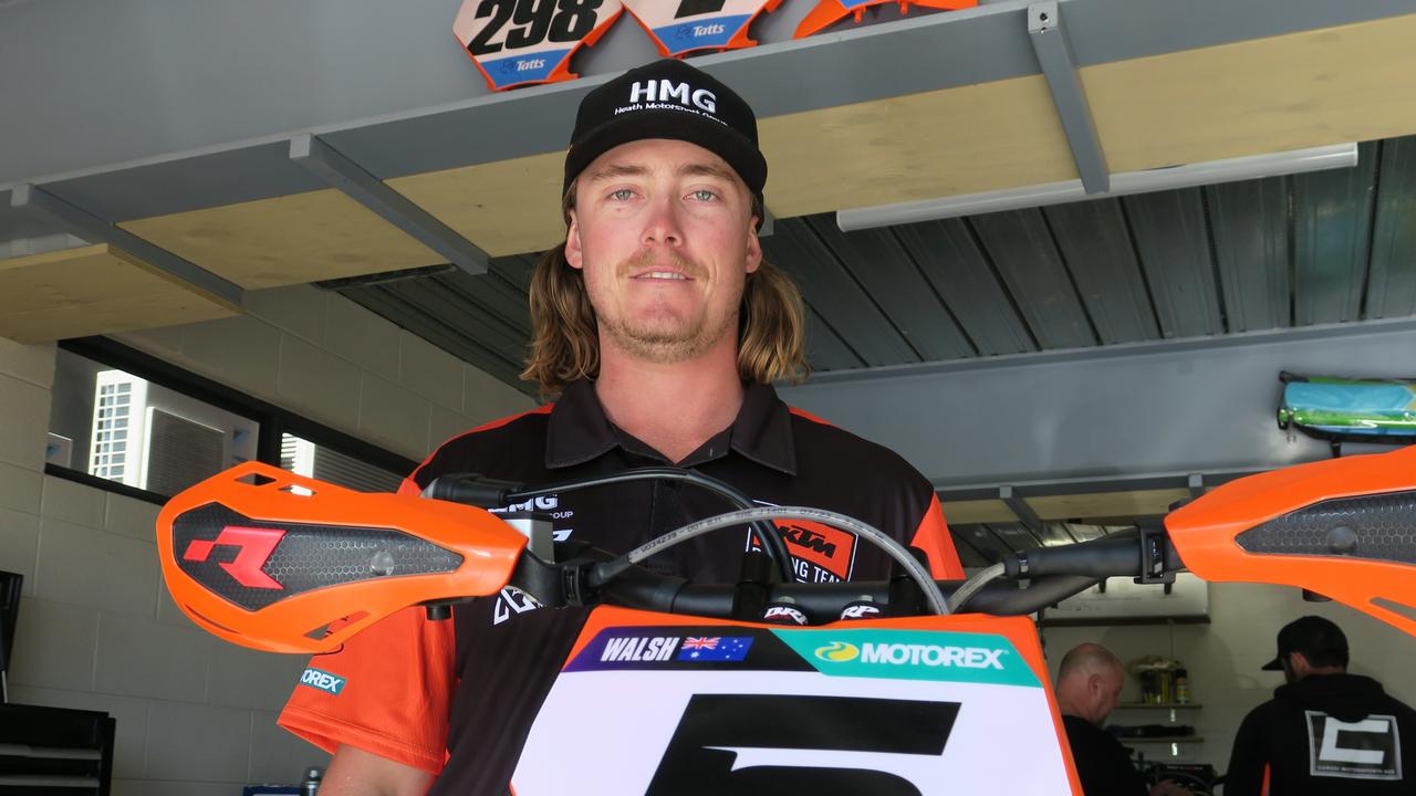 Liam Walsh next to the bike he will race in the 2024 Finke Race.