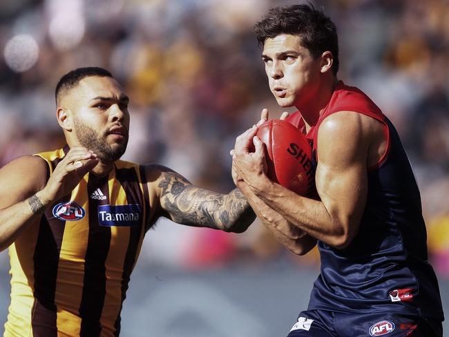 Jay Lockhart of the Demons marks the ball during the Round 7 AFL match between the Melbourne Demons and the Hawthorn Hawks at the MGC in Melbourne, Saturday, May 4, 2019.  (AAP Image/Daniel Pockett) NO ARCHIVING, EDITORIAL USE ONLY