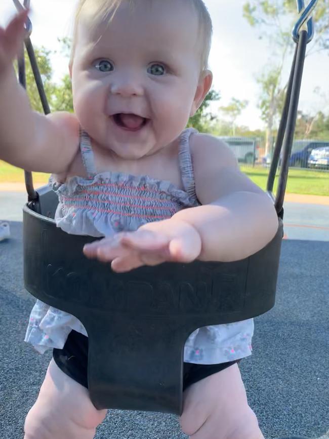 Courtney Crawford enjoying her first ever time on a swing! Picture: Kelly Crawford