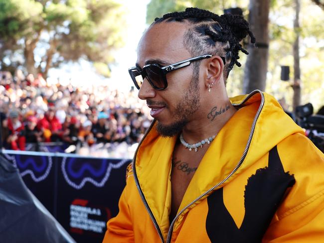 Fanfare greets Hamilton as he walks past. Picture: Getty