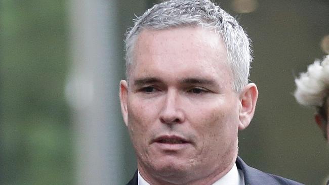 This image has been ID-ed. Craig Thomson leaves County Court on Monday, November 24, 2014, in Melbourne, Australia. Former MP Thomson is appealing against his conviction and jail term for the misuse of HSU funds. Picture: Hamish Blair