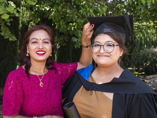 Graduate Sushila Duwal with mum Subhadra Duwal visiting from Nepal at a UniSQ graduation ceremony at Empire Theatres, Tuesday, October 31, 2023. Picture: Kevin Farmer