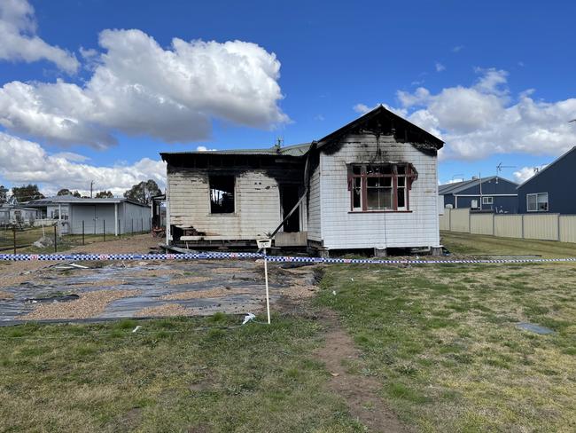 Police are treating as suspicious a fire that completely gutted one Granite Belt home and damaged another on Tuesday morning.