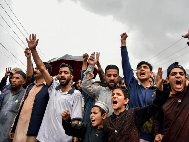 Kashmiri Muslims shout anti-Indian slogans after offering Friday prayers following Indian strikes in Muzaffarabad, the capital of Pakistan-administered Kashmir. Picture: AFP