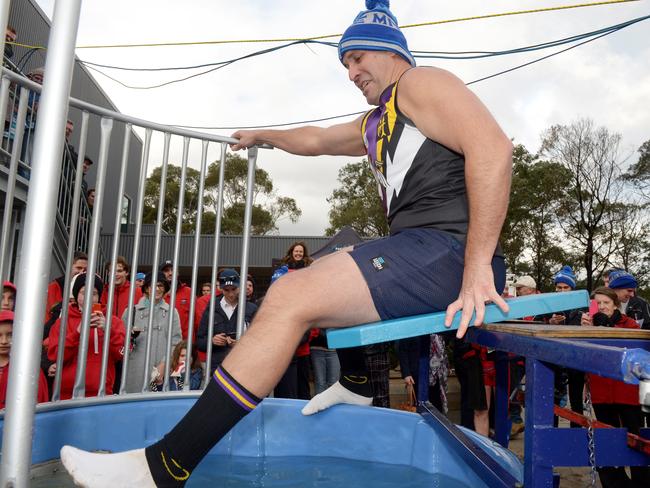 Norwood president Mark Etherington takes his position on the platform. Picture: Steve Tanner