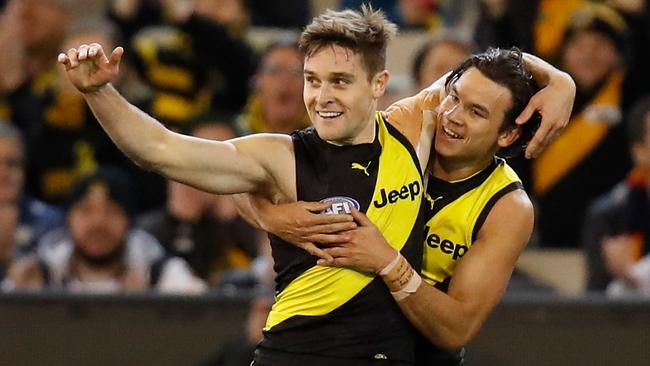 Jayden Short (L) and Daniel Rioli. (Photo by Michael Willson/AFL Media/Getty Images)