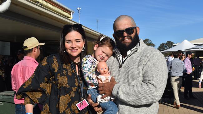 Jessica, Mila and Kurt at the Roma Rugby Races at Bassett Park on Saturday June 24, 2023. Picture: Chloe Cufflin.
