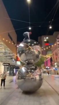 Thrill-seeker spotted jumping on Malls Balls