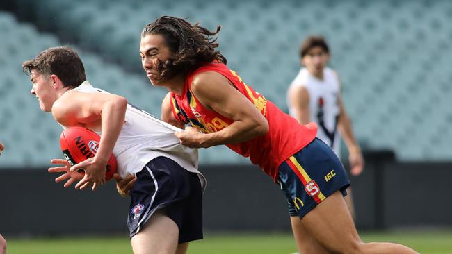 South Australia’s Kai Pudney tackles during a state under-18s game. Picture: AAP