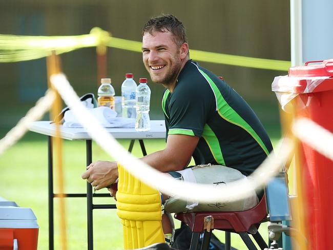 A smiling Aaron Finch after a one-on-one session with Australia batting coach Michael Di Venuto.