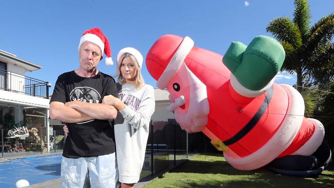 Christmas fan Marlon Pritchard and wife Nessy are feeling as deflated as this Santa over the end of the beloved lights competition. Picture by Richard Gosling