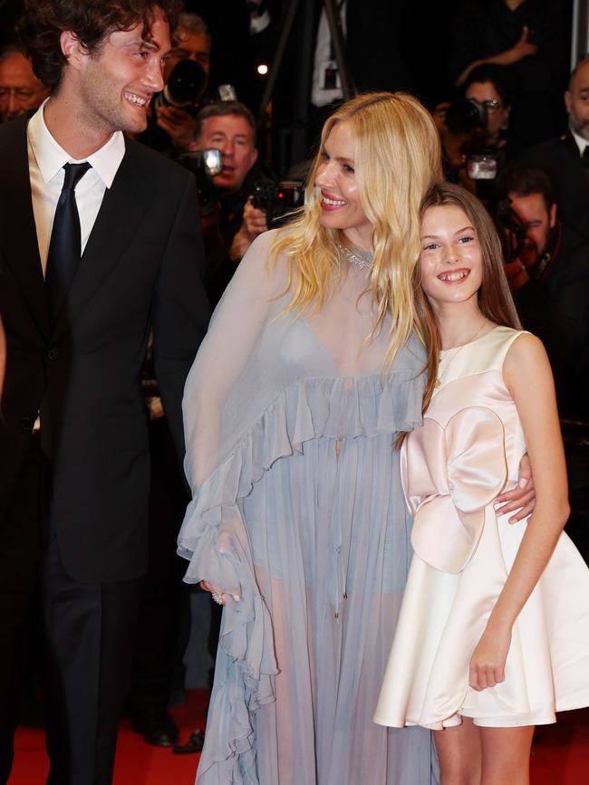 Sienna Miller alongside her daughter and boyfriend, Picture: Pascal Le Segretain/Getty Images