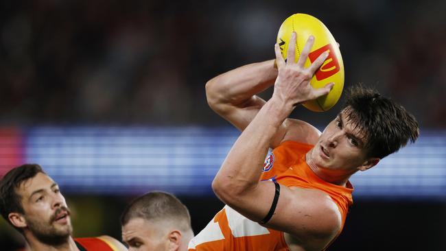 MELBOURNE, AUSTRALIA. May 11, 2024. AFL Round 10. Essendon vs GWS Giants at Marvel Stadium. Sam Taylor of the Giants marks during the 3rd qtr. . Pic: Michael Klein