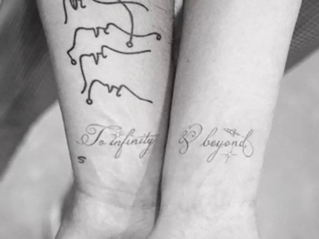 The couple have matching tattoos inspired by a Toy Story phrase.